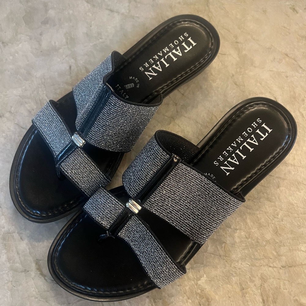 Silver colored slip on shoes with elastic band